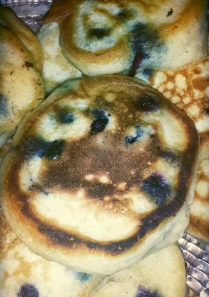 A picture of Fluffy homemade Bluberry pancakes.