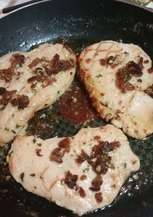 A picture of Grilled Chicken with Bacon Lemon Garlic Butter Sauce.