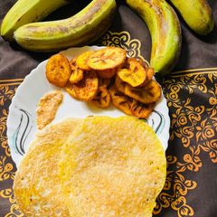 A picture of Kacha kela masala fry, bhaji with mini rava Dosa with peanut chatani for lunch or brunch.