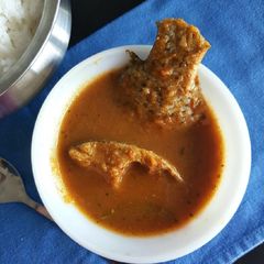 A picture of Fish curry/ Meen Kuzhambu.