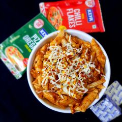 A picture of Little millet Red sauce pasta for kids.