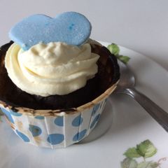 A picture of Chocolate Genoise Sponge Cupcakes with Whipped Cream and Blue Fondant.