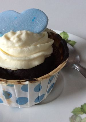 A picture of Chocolate Genoise Sponge Cupcakes with Whipped Cream and Blue Fondant.