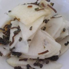 A picture of Pickled Daikon Radish with Shiso.