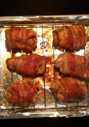 A picture of Bacon rapped Chicken Thighs.