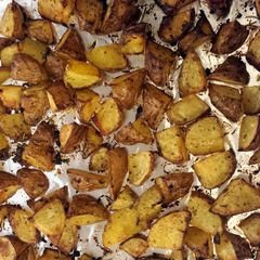 A picture of Crispy Baked Rosemary Chicken & Potatoes.