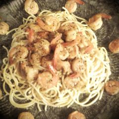 A picture of Lemon Pepper Shrimp over Pasta.