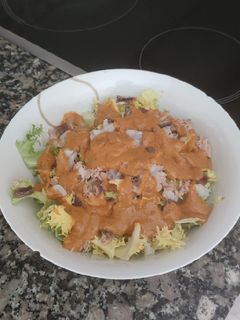 Una foto de Escarola con romesco