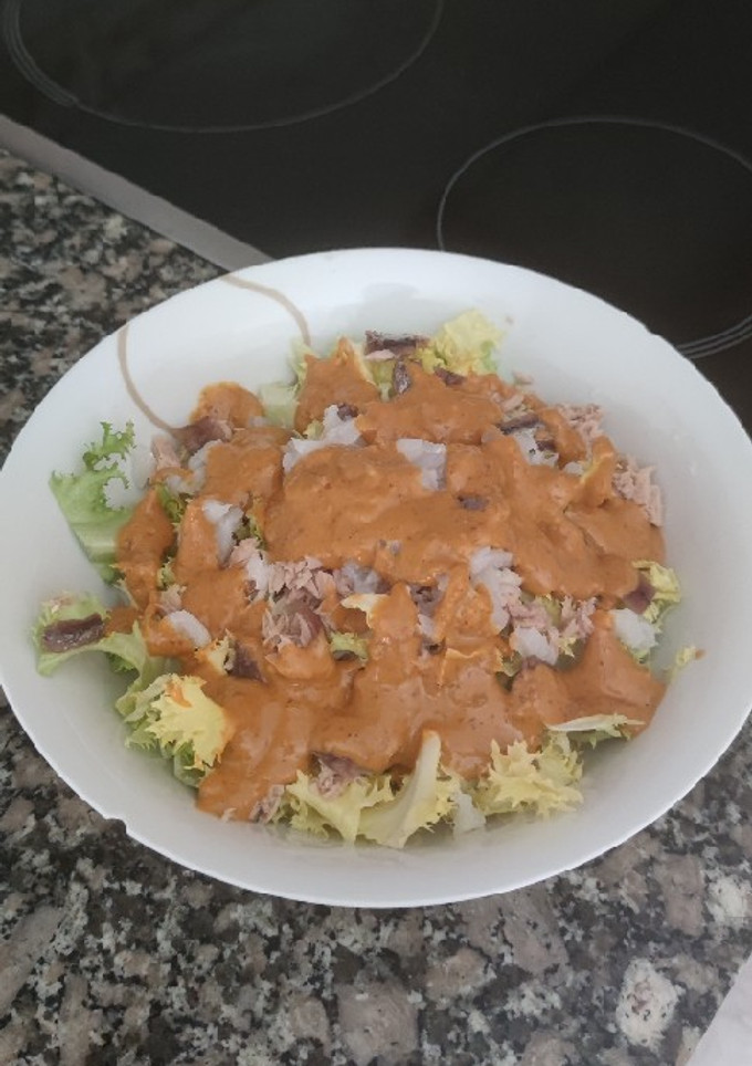Una foto de Escarola con romesco