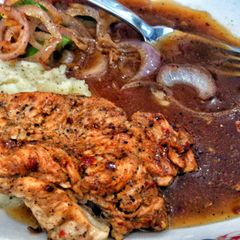 chicken steak wid brown sauce A picture of chicken steak wid brown sauce.