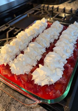 A picture of Strawberry jello poke cake.