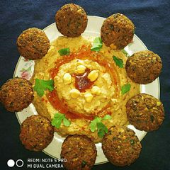 A picture of FALAFEL and HUMMUS.