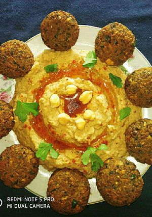 A picture of FALAFEL and HUMMUS.