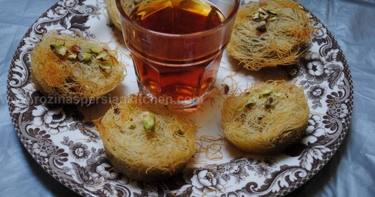 Kataifi traditional dessert in a golden tray