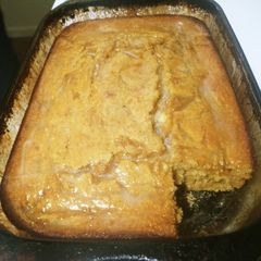 A picture of Sweet Potato Cornbread w/ Honey Butter Sauce.