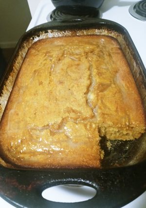 A picture of Sweet Potato Cornbread w/ Honey Butter Sauce.