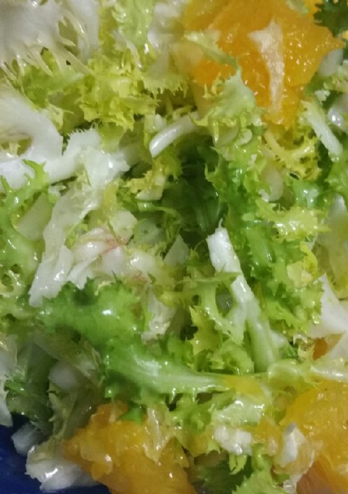 Una foto de Escarola con naranjas