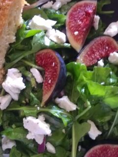A picture of Fig and goat cheese salad.