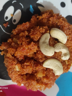 A picture of Carrot and dry fruits halwa.