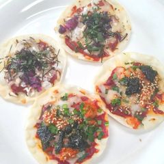 Japanese and Korean style snack pizza A picture of Japanese and Korean style snack pizza.