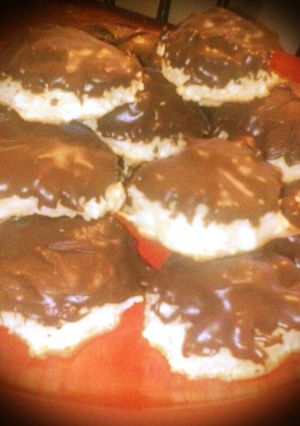 A picture of Coconut Macaroon Cookies (Chocolate Dipped).