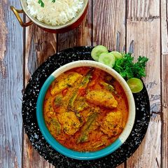 A picture of Tengra Macher Jhol (Bengali Tengra Fish Curry).
