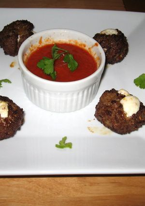 A picture of Smoked Mozzarella Stuffed Meatballs.