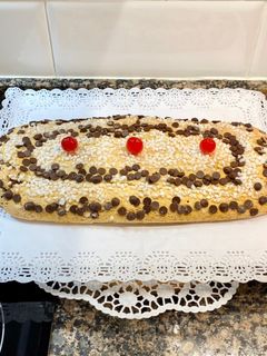 Una foto de Pastel enrollado relleno de Nutella, “sin gluten “