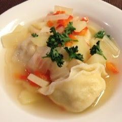 A picture of Pelmeni - Boiled Russian Gyoza in Soup.