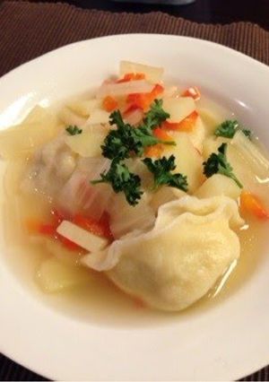 A picture of Pelmeni - Boiled Russian Gyoza in Soup.