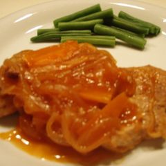 A picture of Pork Fillets with Vegetable Sauce.