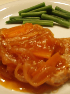 A picture of Pork Fillets with Vegetable Sauce.