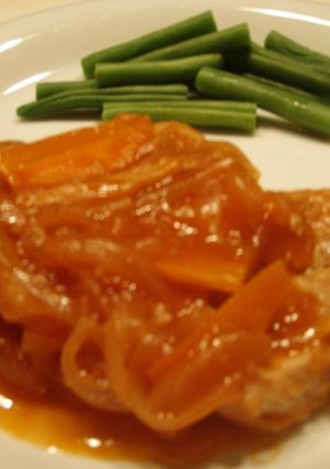 A picture of Pork Fillets with Vegetable Sauce.
