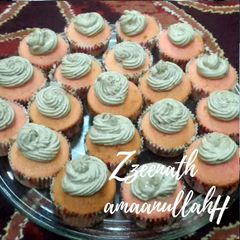 A picture of Strawberry Cupcakes with Chocolate Whipped Cream.