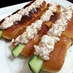 A picture of Salmon Spread In Hotdog Bun.