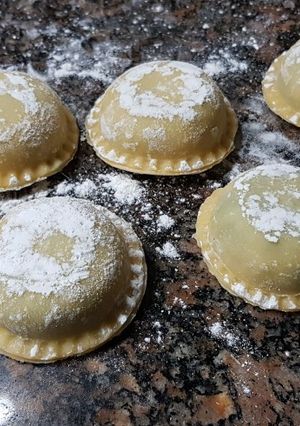Una foto de Sorrentinos de pollo y espinaca