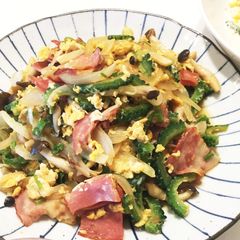 A picture of Stir fried Goya with eggs and bacon 🍳.