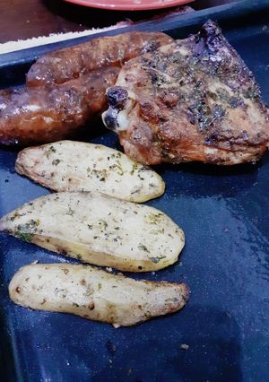 Una foto de Papas Asadas