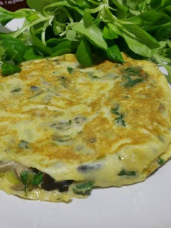 Foto principal de Omelette con setas, ajitos y cilantro