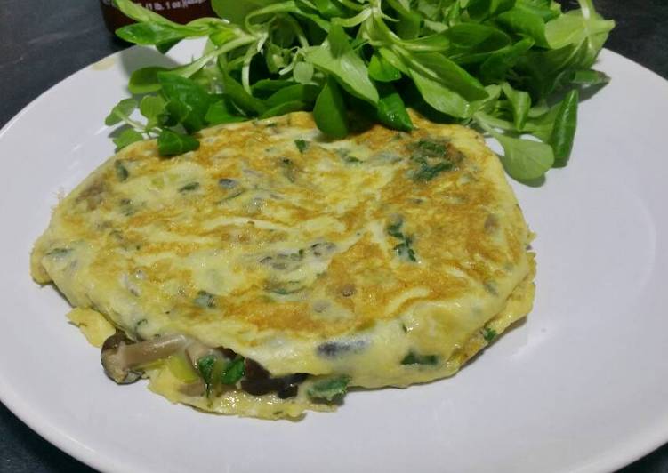 Omelette con setas, ajitos y cilantro