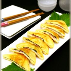 A picture of Fried Tofu (Aburaage) Appetizers with Shiso, Bacon, and Cheese.