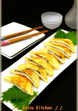 A picture of Fried Tofu (Aburaage) Appetizers with Shiso, Bacon, and Cheese.