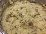 A picture of mashed potatoes with sour cream