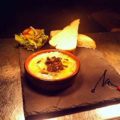 A picture of Camembert With Walnut Topping.