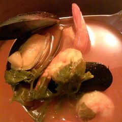 A picture of spicy seafood soup.