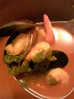 A picture of spicy seafood soup.