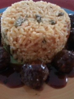 A picture of Meatballs with sweet and sour sauce.
