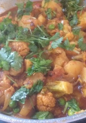 A picture of Aloo Gobi Matar (Potato, Cauliflower, and Peas Curry).