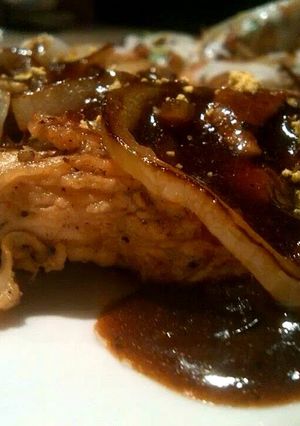 A picture of Marinated chicken with brown sauce..