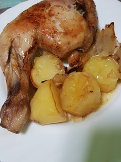 Una foto de Cuartos de pollo al horno